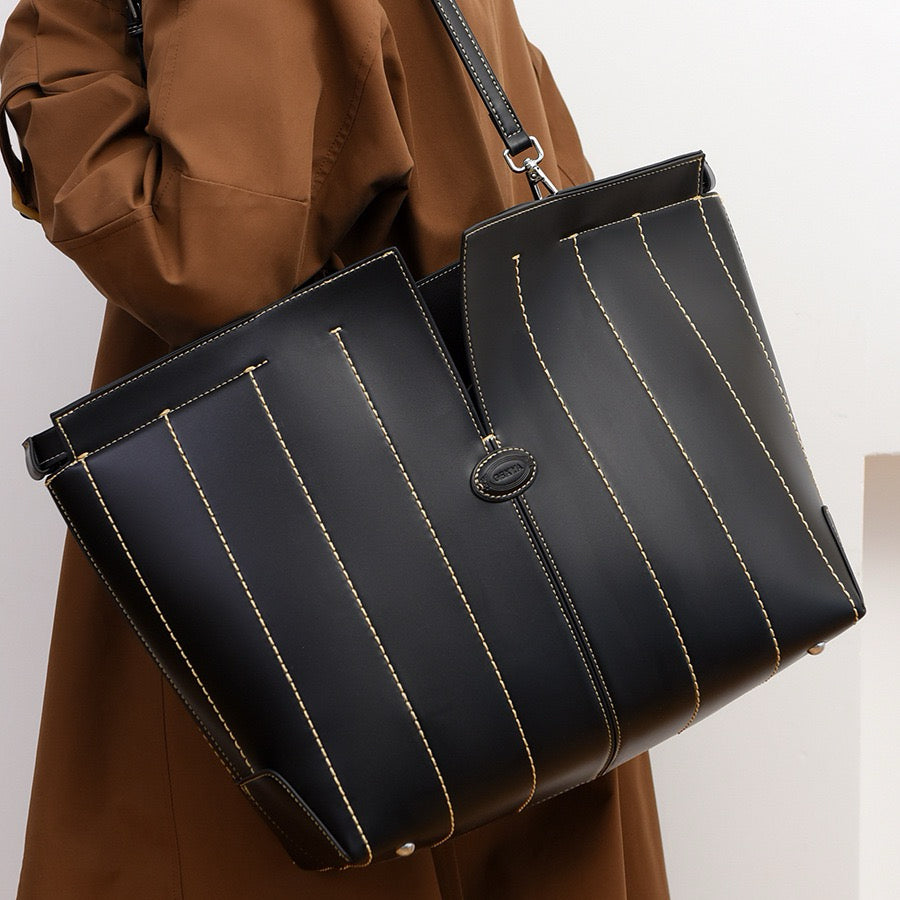 A timeless leather tote for the modern working woman on the go