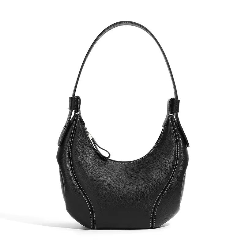 Comfortable and Chic Handbag with Rolled Top Handles and Adjustable Strap